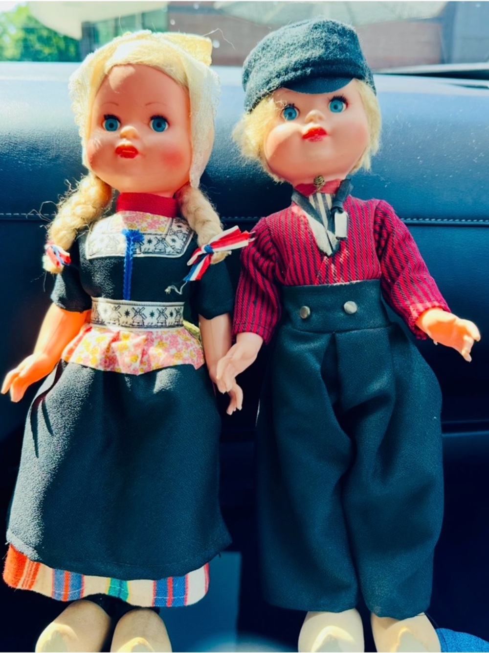Classic Pair of Blonde Dolls in Black and Red Traditional Outfits